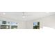 Spacious bedroom with ceiling fan, recessed lighting and large windows at 18434 Goodman Cir, Port Charlotte, FL 33948