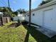 Small backyard with fire pit and seating area at 1849 New Hampshire Ne Ave, St Petersburg, FL 33703