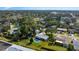 Aerial view of house, neighborhood, and surrounding landscape at 1985 Byram Dr, Clearwater, FL 33755