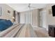 Bedroom with large closet and carpet flooring at 1985 Byram Dr, Clearwater, FL 33755