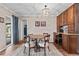 Dining area with built-in hutch and wood table with four chairs at 1985 Byram Dr, Clearwater, FL 33755