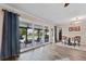 Bright dining room with sliding doors to the backyard pool at 1985 Byram Dr, Clearwater, FL 33755