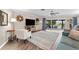 Spacious living room with large windows, a cozy rug and plenty of natural light at 1985 Byram Dr, Clearwater, FL 33755