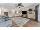 Spacious living area with hardwood floors and access to multiple rooms at 1985 Byram Dr, Clearwater, FL 33755