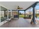 Relaxing covered patio with seating and pool view at 1985 Byram Dr, Clearwater, FL 33755