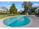 Relaxing kidney-shaped pool, perfect for summer at 1985 Byram Dr, Clearwater, FL 33755