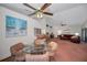 Bright dining area with glass table and view into living room at 2058 Villa Ter, Clearwater, FL 33763