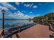 Community dock offering serene lake access with seating at 2058 Villa Ter, Clearwater, FL 33763