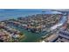 Aerial view of a waterfront home in a peaceful, desirable neighborhood at 207 8Th E St, Tierra Verde, FL 33715