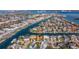 Aerial view showcasing home's waterfront location and neighborhood at 207 8Th E St, Tierra Verde, FL 33715