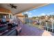 Relaxing balcony with water views and comfortable seating at 207 8Th E St, Tierra Verde, FL 33715