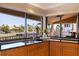 Kitchen with water view and breakfast bar at 207 8Th E St, Tierra Verde, FL 33715