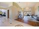 Elegant living room with hardwood floors, high ceilings and water views at 207 8Th E St, Tierra Verde, FL 33715