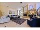 Spacious living room featuring a fireplace and comfortable seating at 207 8Th E St, Tierra Verde, FL 33715