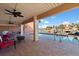 Relaxing pool area with patio furniture, offering water views at 207 8Th E St, Tierra Verde, FL 33715