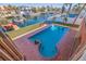 Inviting pool with brick patio and canal views at 207 8Th E St, Tierra Verde, FL 33715
