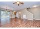 Open living space with hardwood floors and kitchen views at 2131 Golden Oak Ln, Valrico, FL 33594