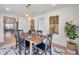 Light-filled dining room with wooden table and kitchen view at 2570 16Th S Ave, St Petersburg, FL 33712