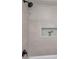 Clean shower with updated fixtures and mosaic tile detail at 2570 16Th S Ave, St Petersburg, FL 33712