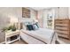 Comfortable bedroom featuring a queen-sized bed, stylish nightstands, and ample natural light at 2762 Pearly Banks Dr, Bradenton, FL 34208