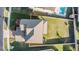 Aerial view of house, yard, and neighborhood at 30868 Kelmin Ter, Wesley Chapel, FL 33543