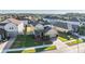 Aerial view of house and surrounding homes at 30868 Kelmin Ter, Wesley Chapel, FL 33543