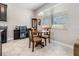 Small breakfast nook with a round table and chairs at 30868 Kelmin Ter, Wesley Chapel, FL 33543