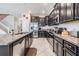 Modern kitchen with stainless steel appliances and granite countertops at 30868 Kelmin Ter, Wesley Chapel, FL 33543