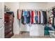 Large walk-in closet with ample hanging space and shelving at 30868 Kelmin Ter, Wesley Chapel, FL 33543