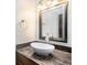 Bathroom with granite vanity and modern sink at 32328 Fish Hook Loop, Wesley Chapel, FL 33545