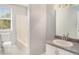 Clean bathroom with a tub, sink, and vanity at 32328 Fish Hook Loop, Wesley Chapel, FL 33545