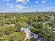 Aerial view showcasing home, pool, and surrounding neighborhood at 3314 W Barcelona St, Tampa, FL 33629