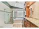 Spa-like bathroom with a large shower, soaking tub, and double vanity at 3314 W Barcelona St, Tampa, FL 33629