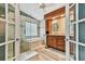 Elegant bathroom with double vanity, soaking tub, and glass shower at 3314 W Barcelona St, Tampa, FL 33629