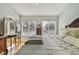 Main bedroom with a king-size bed, hardwood floors, and ample natural light at 3314 W Barcelona St, Tampa, FL 33629