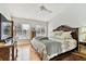 Spacious bedroom with hardwood floors and large windows at 3314 W Barcelona St, Tampa, FL 33629
