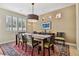 Bright dining room with hardwood floors and a large dining table at 3314 W Barcelona St, Tampa, FL 33629
