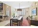 Bright dining room with table, chairs, and view of the pool at 3314 W Barcelona St, Tampa, FL 33629