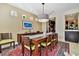 Spacious dining area with hardwood floors and view of kitchen at 3314 W Barcelona St, Tampa, FL 33629