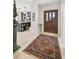 Elegant entryway with hardwood floors and a view of the kitchen at 3314 W Barcelona St, Tampa, FL 33629