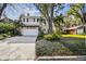 Two-story house with attached garage and manicured landscaping at 3314 W Barcelona St, Tampa, FL 33629