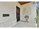 Inviting entryway with a decorative relief and side table at 3314 W Barcelona St, Tampa, FL 33629
