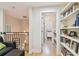 Hallway with built in shelving and laundry area at 3314 W Barcelona St, Tampa, FL 33629