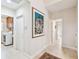 Elegant hallway with large artwork and tile floors at 3314 W Barcelona St, Tampa, FL 33629