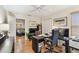Home office with built-in desk and hardwood floors at 3314 W Barcelona St, Tampa, FL 33629