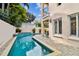 Inviting pool with brick patio and exterior access from house at 3314 W Barcelona St, Tampa, FL 33629