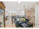 Second floor sitting area with leather couch and built-in shelving at 3314 W Barcelona St, Tampa, FL 33629