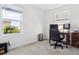 Home office with window views and built-in desk at 34196 Polacca Ln, Wesley Chapel, FL 33543
