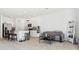 Open-concept kitchen and living area with modern finishes at 34196 Polacca Ln, Wesley Chapel, FL 33543