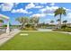 Resort-style pool with lounge chairs and a grassy area at 34196 Polacca Ln, Wesley Chapel, FL 33543